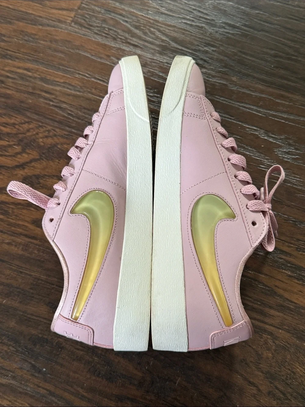 Nike Women's Blush Pink Low-Top Leather Sneakers with Metallic Gold Swoosh